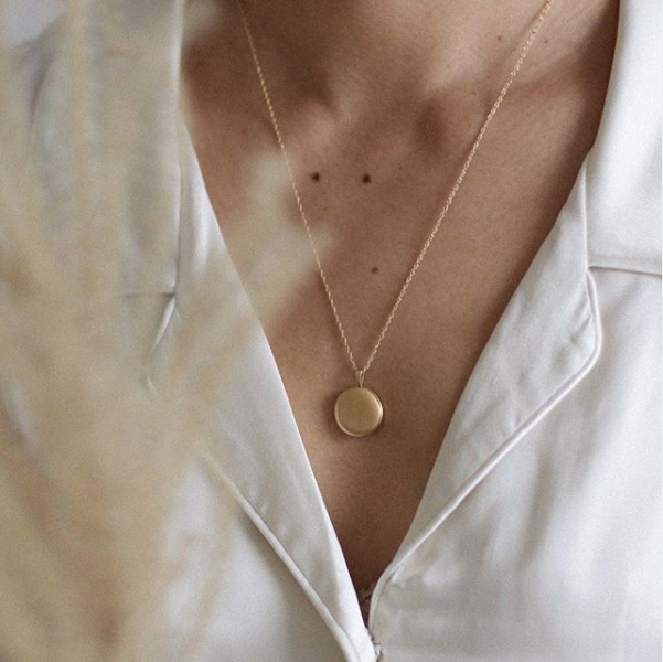 Lisbeth Classic Locket Necklace available in gold and silver.